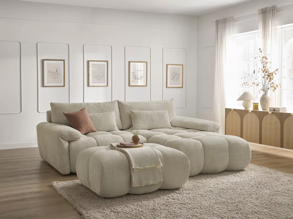 Canapé d'angle fixe IVANE avec dossier avance-recule en tissu texturé et son pouf angle