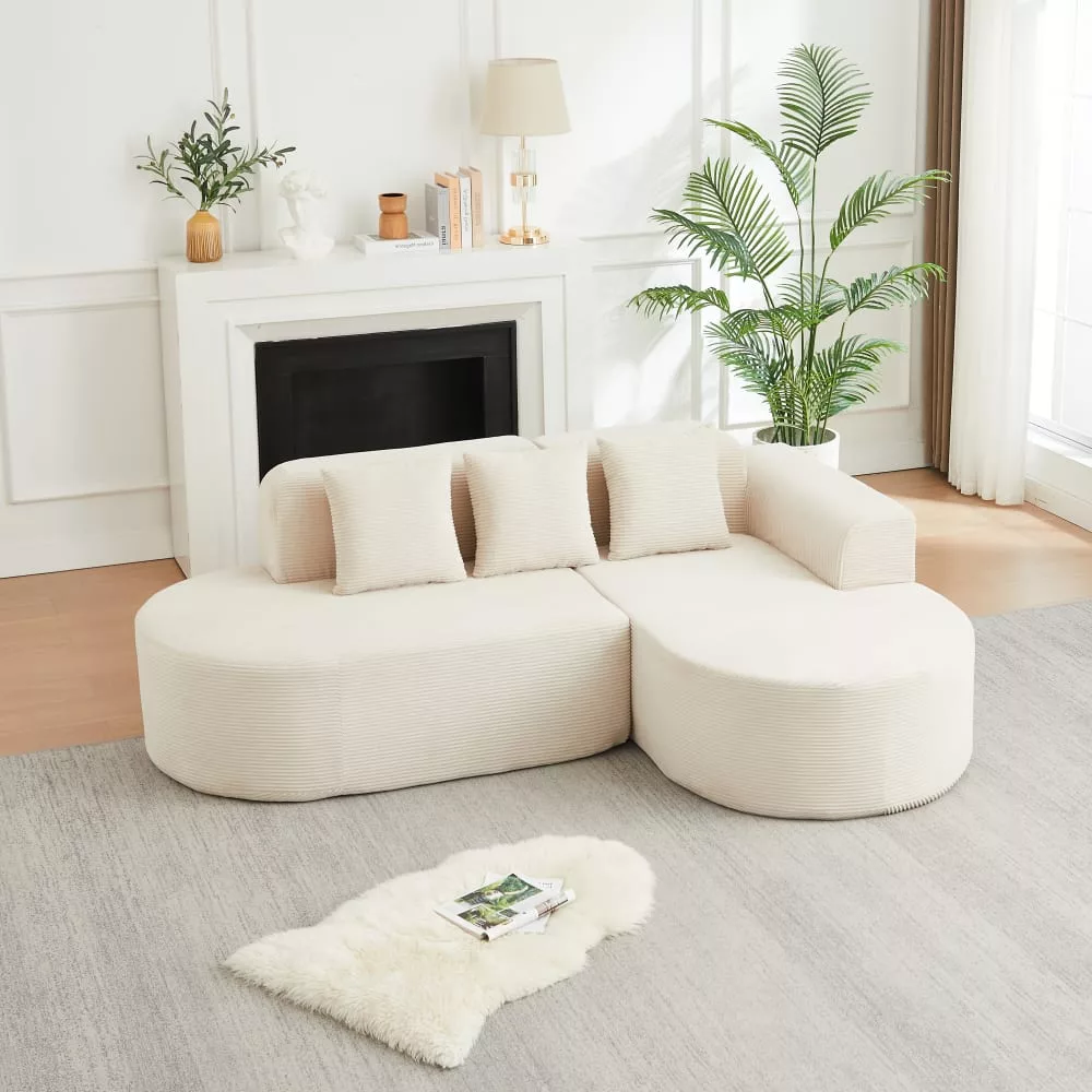 Canapé d'angle modulaire en velours côtelé avec dossier incurvé